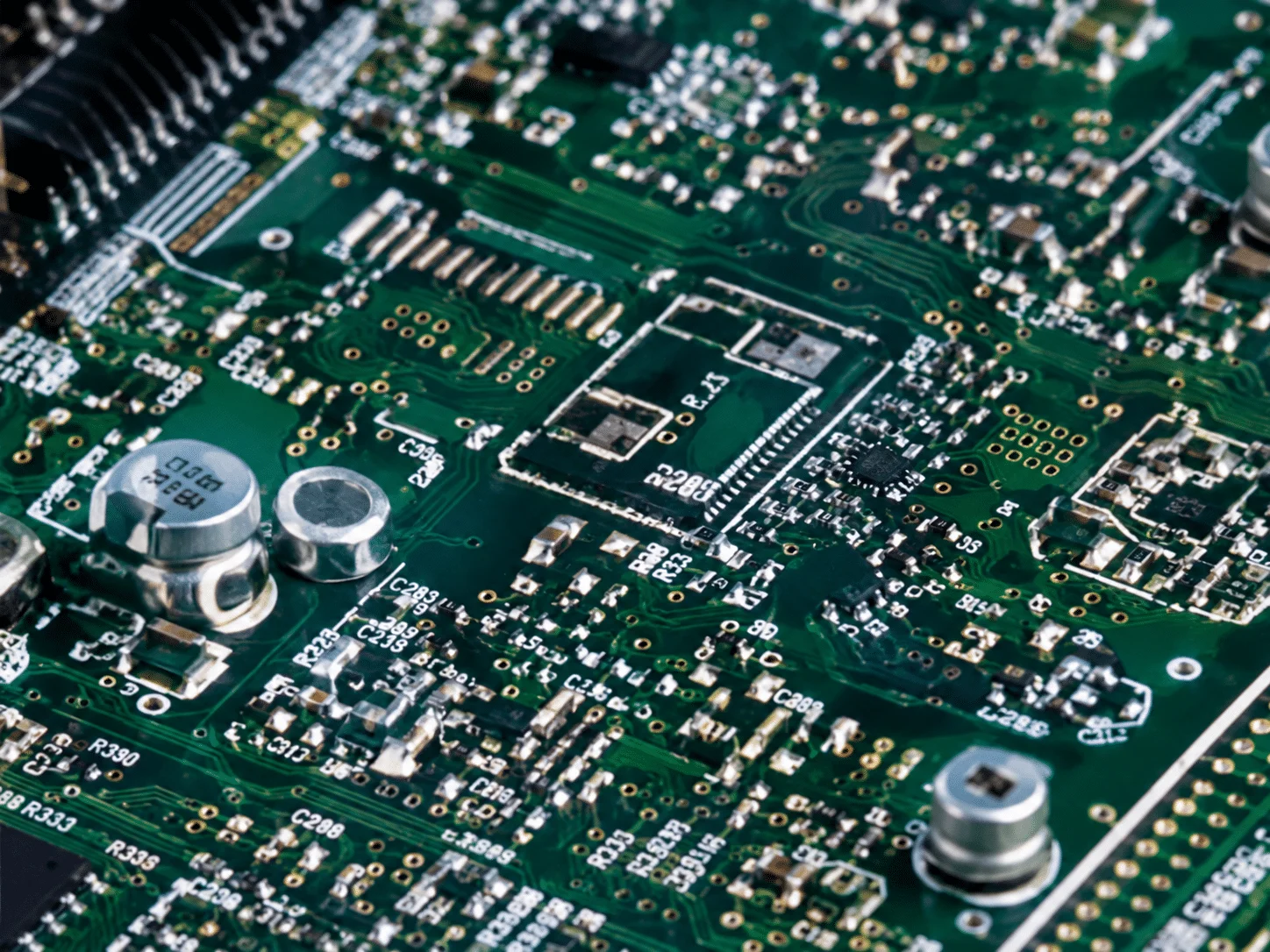Green PCB board with surface mount components for electronics manufacturing