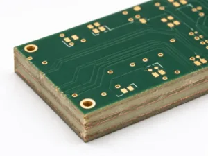 Multilayer PCB showing surface traces and dielectric layers in cross section